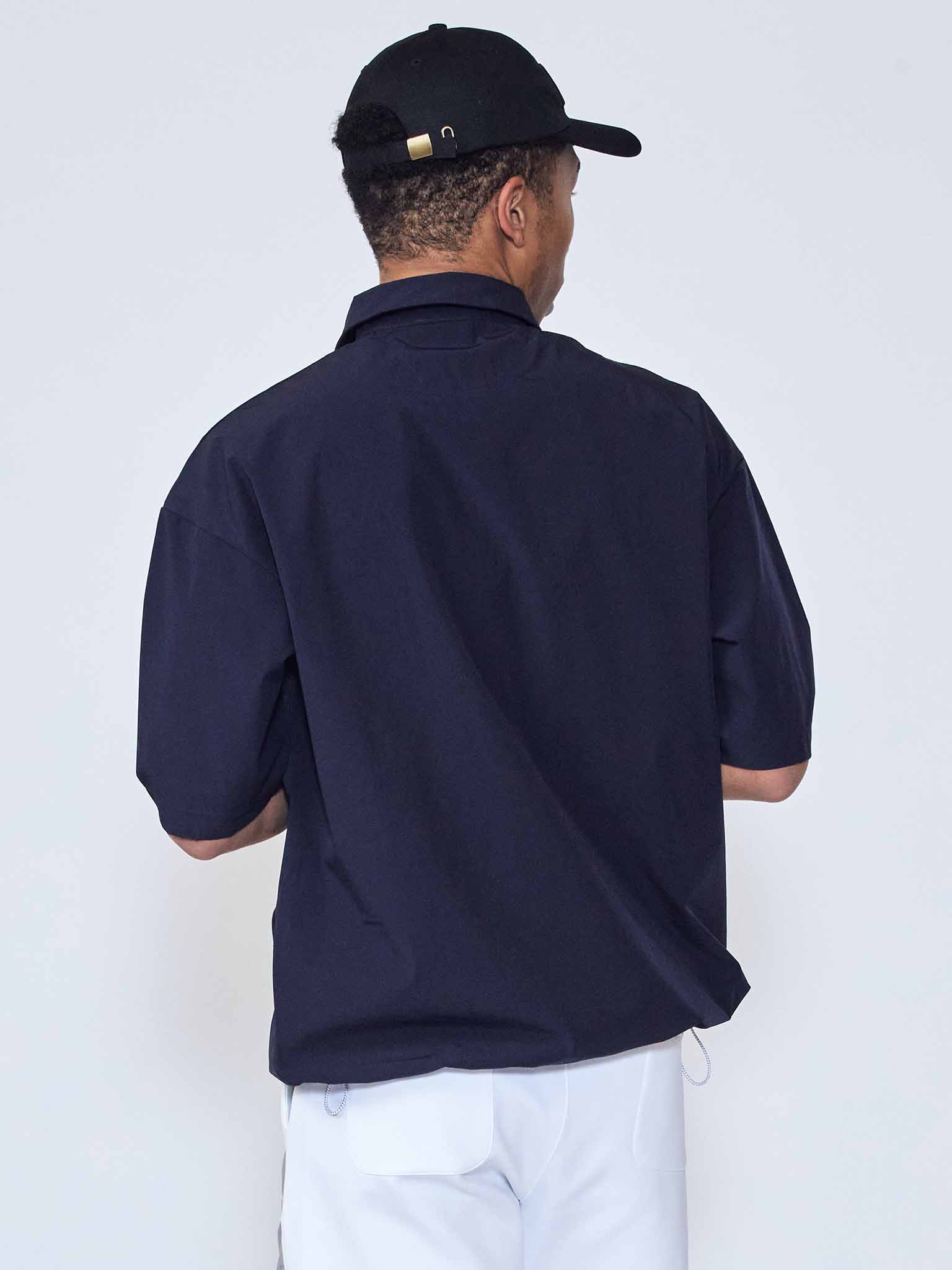 Stretch nylon over polo shirt